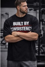 BUILT BY CONSISTENCY – Premium Gym T-Shirt